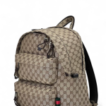 GUCCI Рюкзак тканевый бежевый в монограмму с двумя наружными горизонтальными карманами на молнии