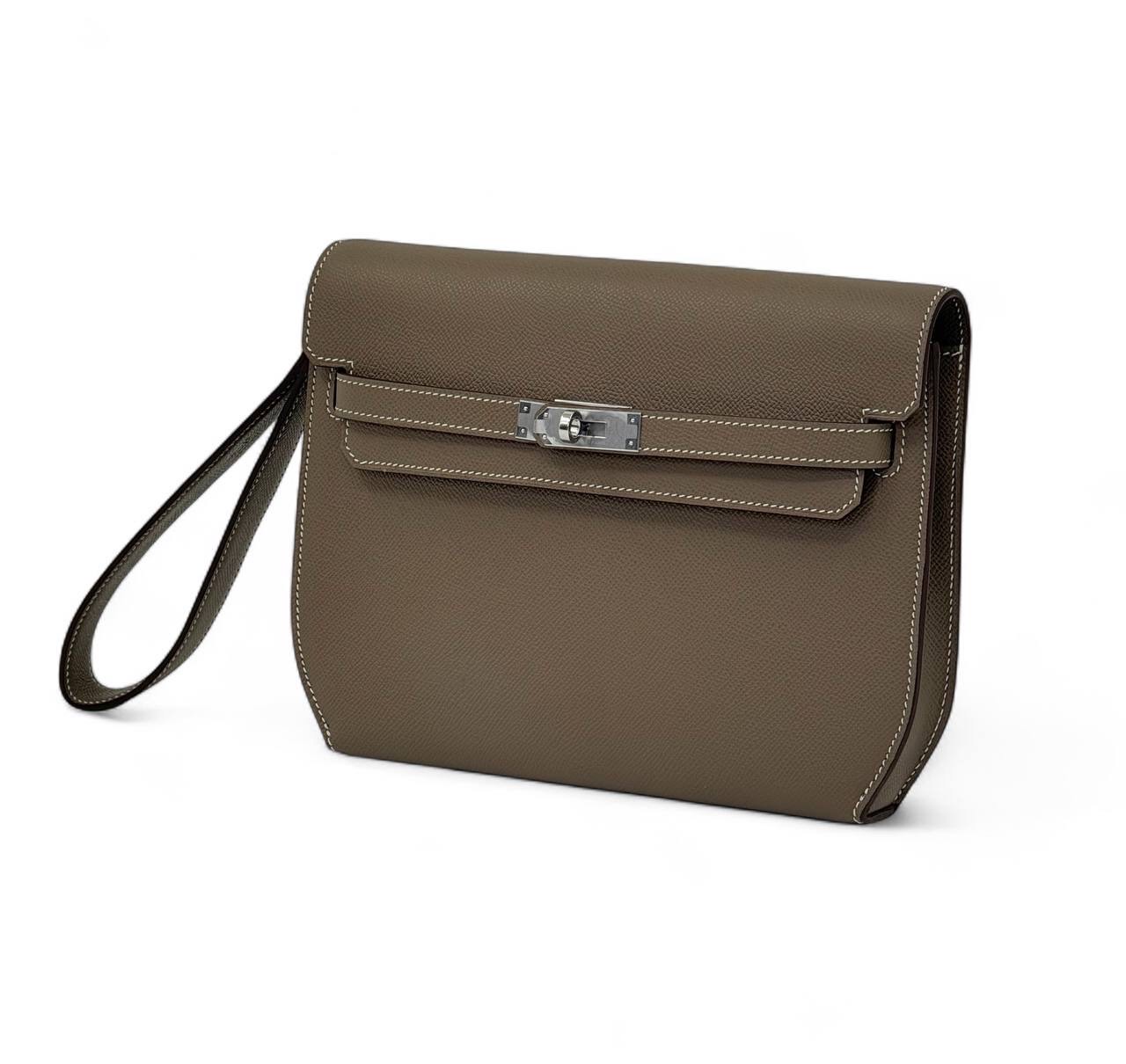 hermes-borsetka-s-dvumya-variantami-remeshkov-kozha-epsom-bezhevaya-zamok-kelly.jpg HERMES борсетка с двумя вариантами ремешков кожа эпсом бежевая замок Kelly — изображение 1