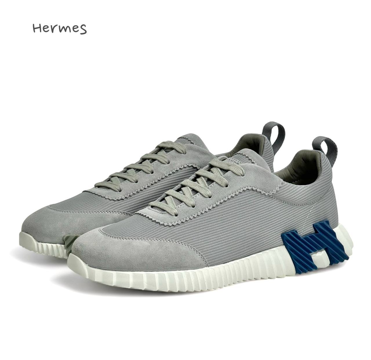 hermes-krossovki-serye-s-membrannoj-vstavkoj-na-beloj-podoshve.png HERMES кроссовки серые с мембранной вставкой на белой подошве — изображение 1