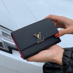 LV кошелек Capucines кожа Того черный сиреневый внутри