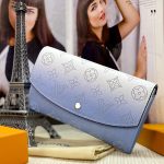 LV кошелек IRIS из Кожи теленка Mahina с перфорацией и градиентом голубой