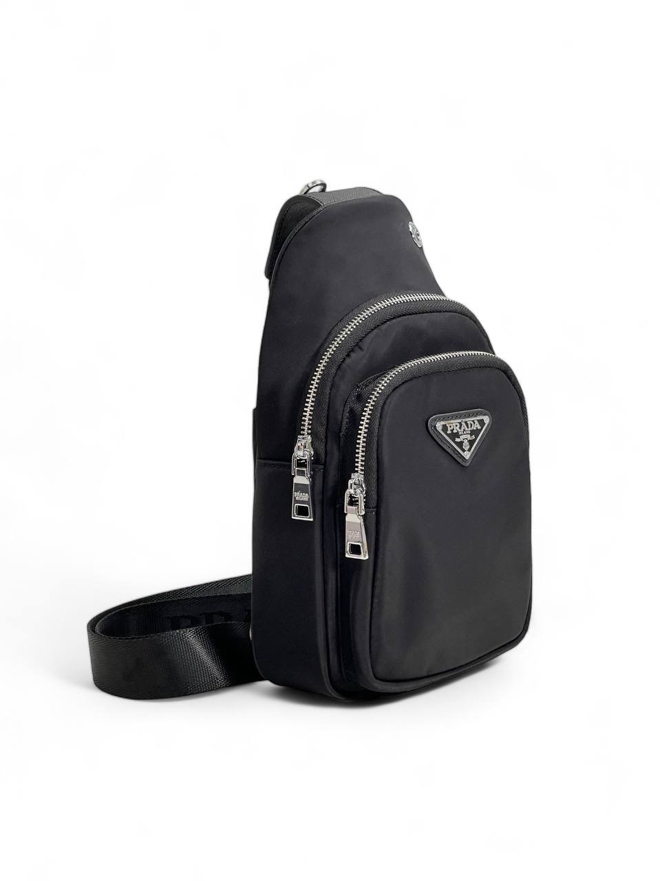 prada-sling-nejlon-chernyj-treugolnyj-logotip-otdelka-iz-kozhi-sofyano.jpg PRADA слинг нейлон черный треугольный логотип отделка из кожи софьяно — изображение 1